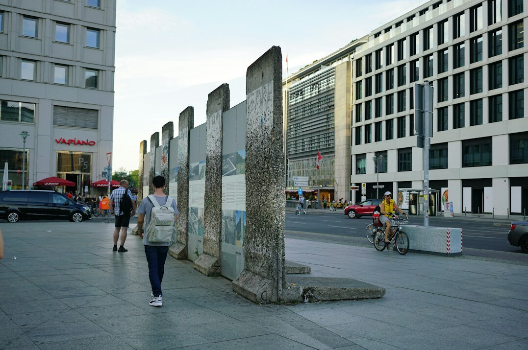 Remaining section of the Berlin Wall with weathered concrete